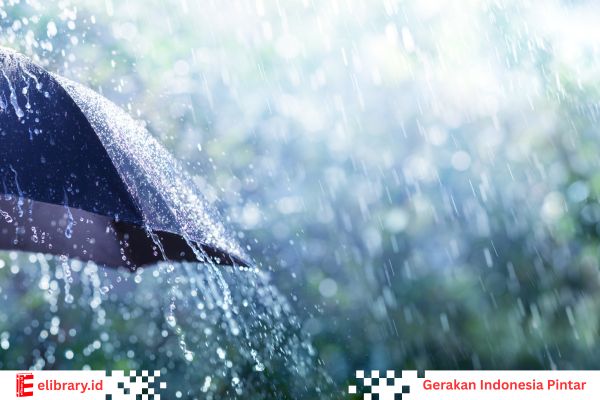 Payung di tengah hujan turun